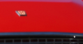 Illustration for article titled Help Us ID the Mystery Roadster of Suzuka